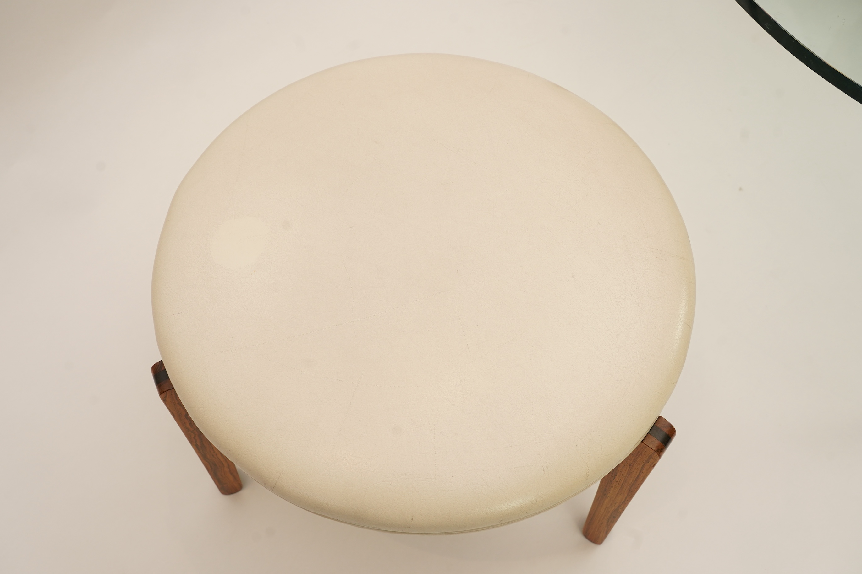 Sven Ellekaer (Danish, 1926-1984) for Christian Linneberg Møbelfabrik: A coffee table and three nesting stools ensuite